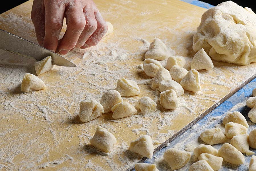 Image of chef preparing gnocchi
