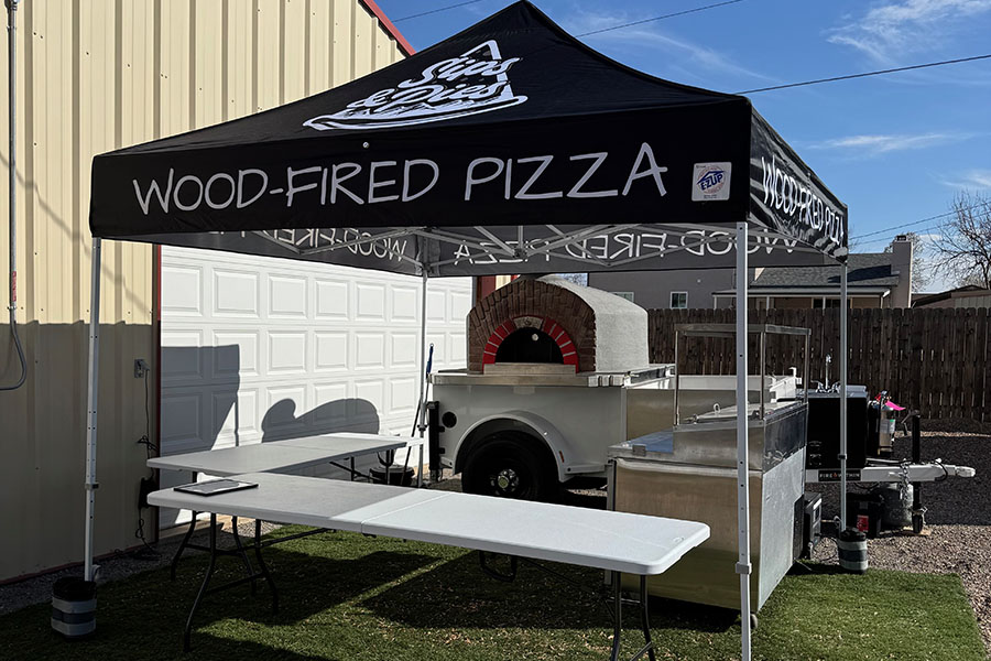 Image of pop-up mobile food event setup for health and fire department inspection.
