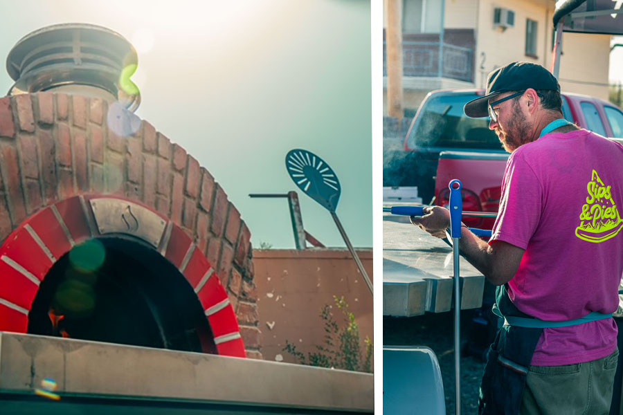 Image of a wood-fired pizza oven and someone using a peel to put a pizza in the oven