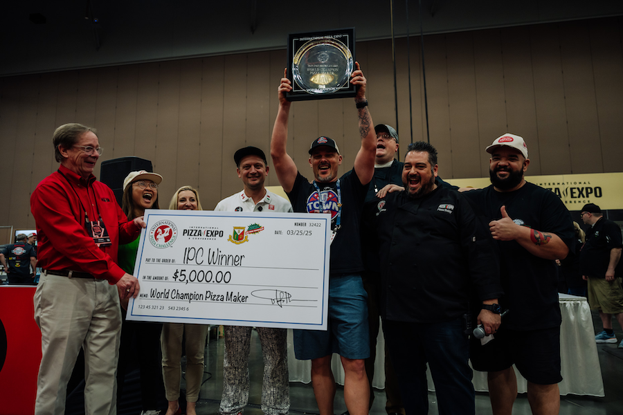 Ryan Ososky, owner of DTown Pizzeria in Los Angeles, wins Pizza Maker of the Year Championship at the International Pizza Challenge during Pizza Expo in Las Vegas.